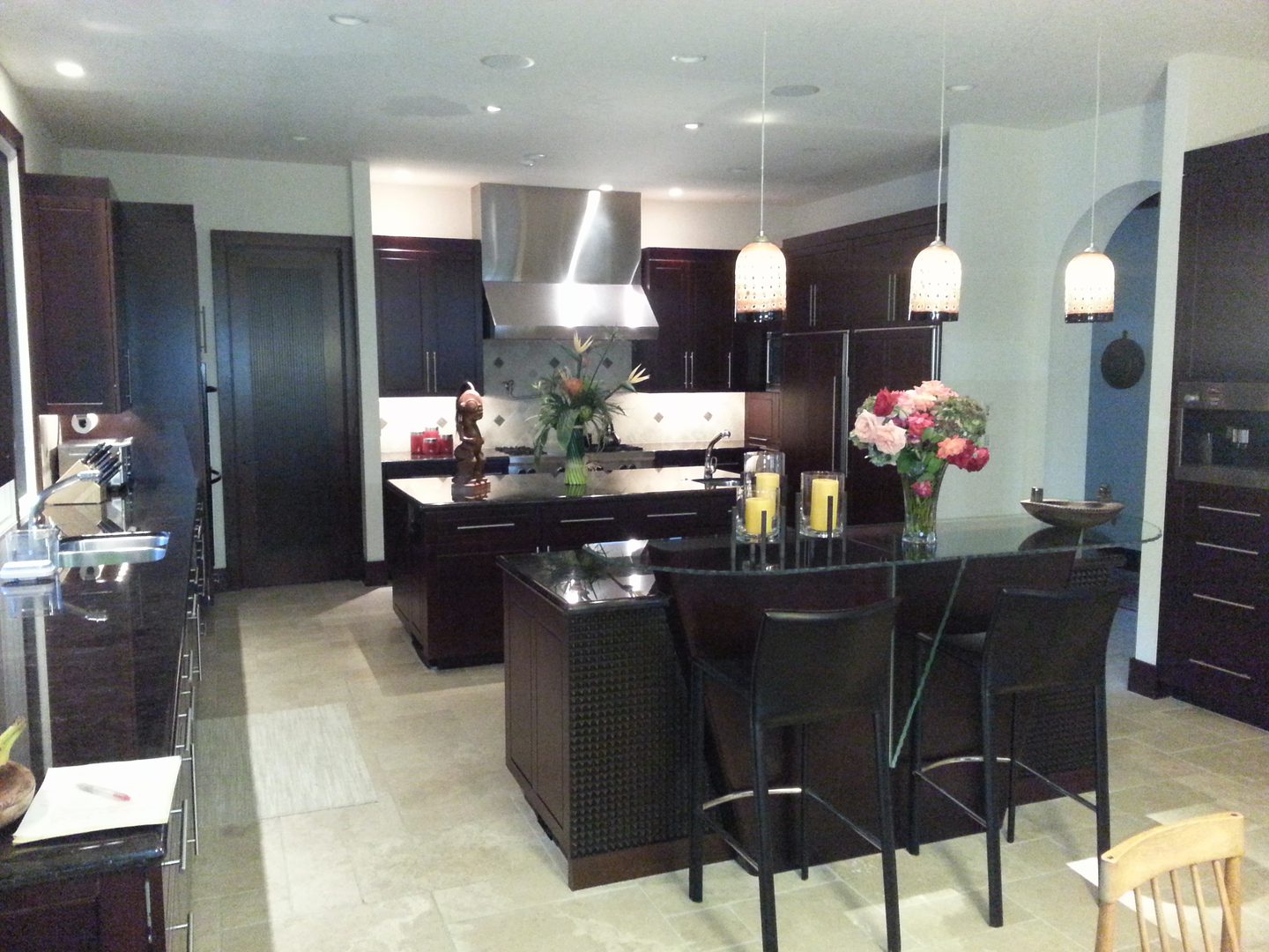 Modern kitchen with dark wood cabinets