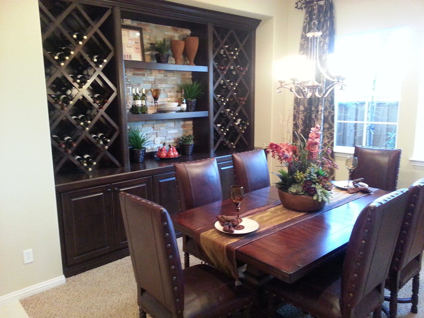 Dining room with wine rack and table