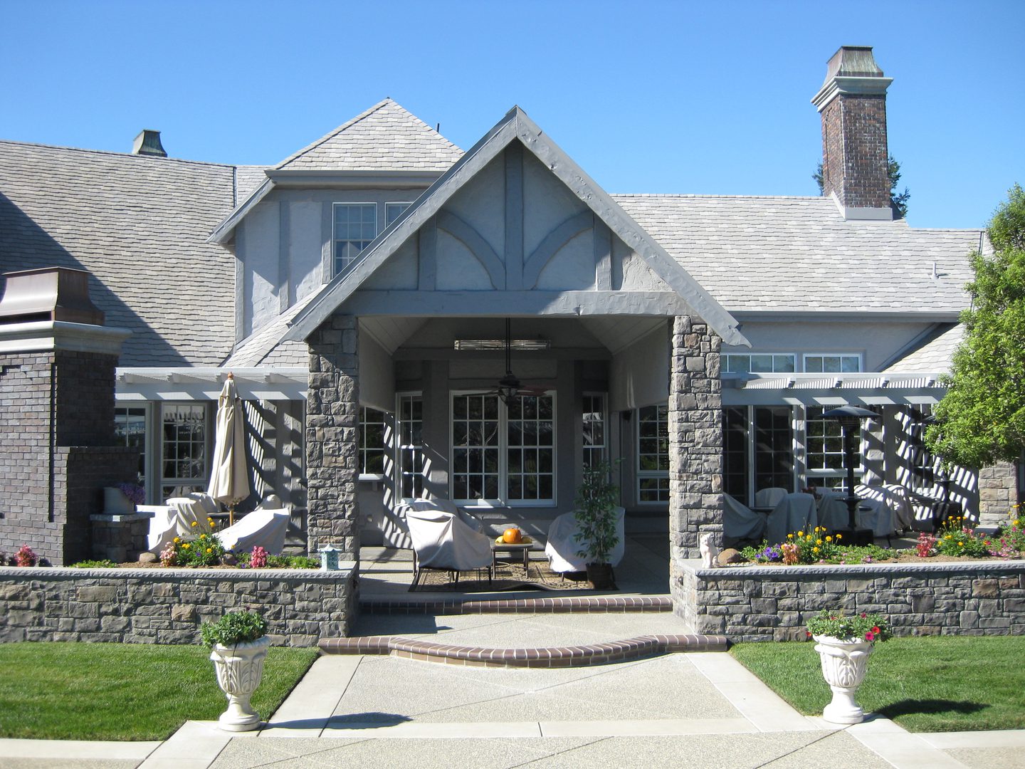 Stone house with porch and garden
