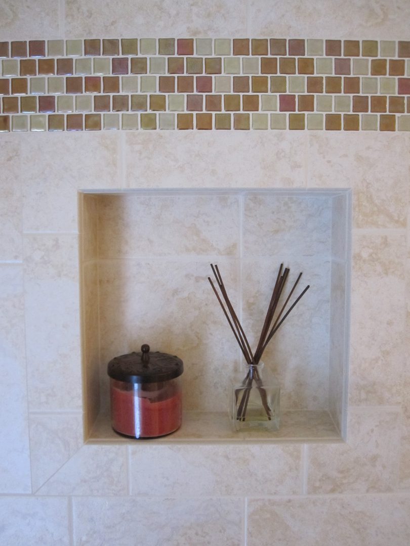 Modern bathroom shelf with scented accessories