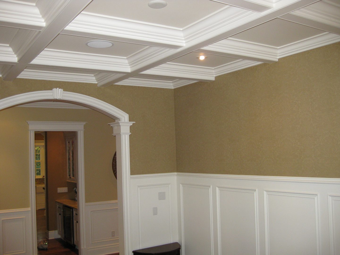 Elegant coffered ceiling and wainscoting