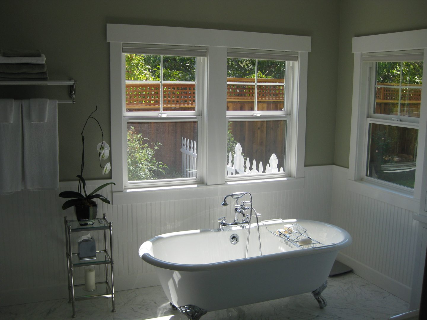 Clawfoot bathtub by sunny window