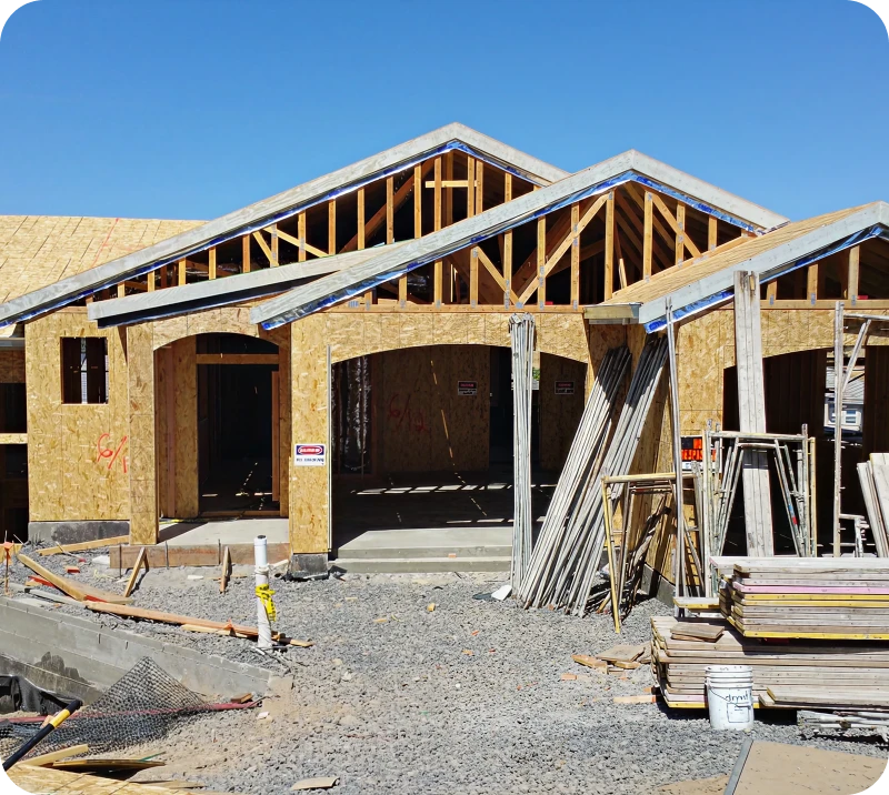House under construction with wooden framework