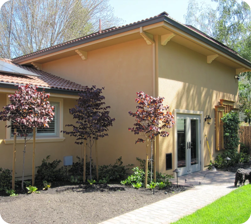 Backyard garden beside a contemporary home