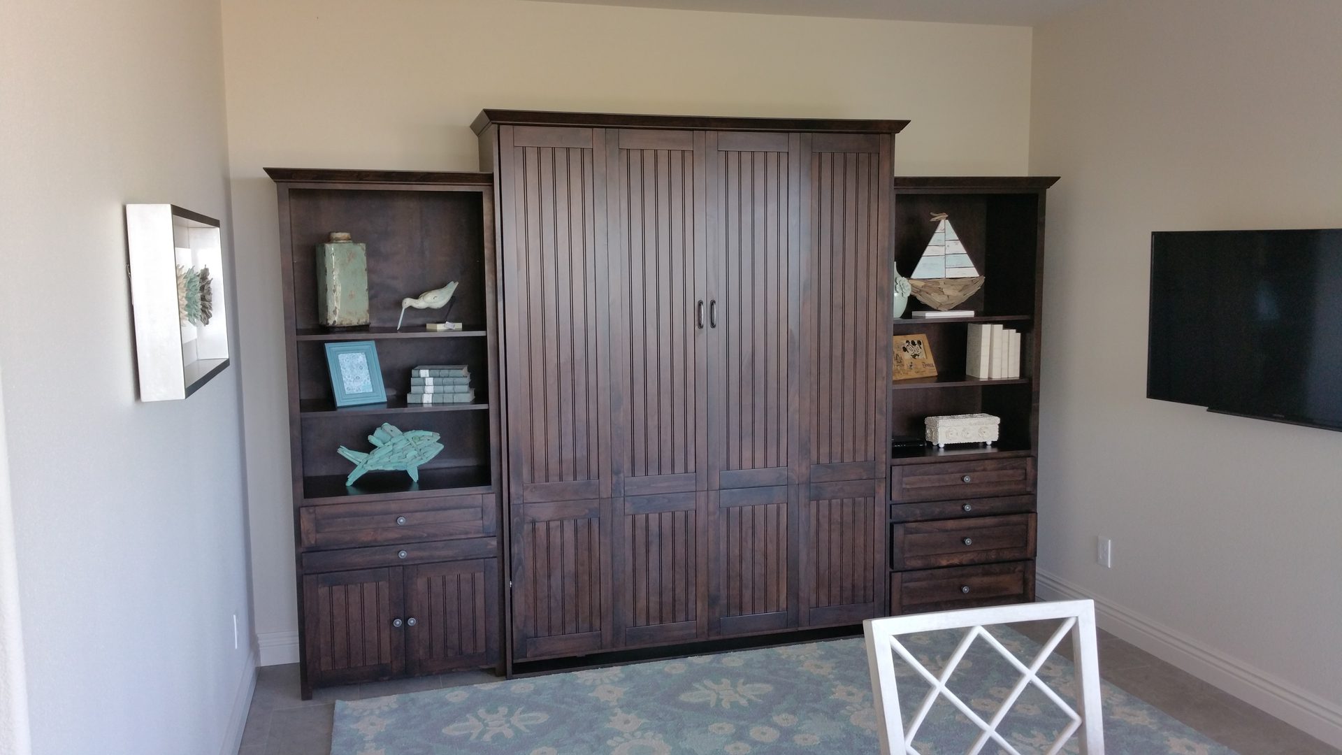 Dark wooden cabinet with bookshelves