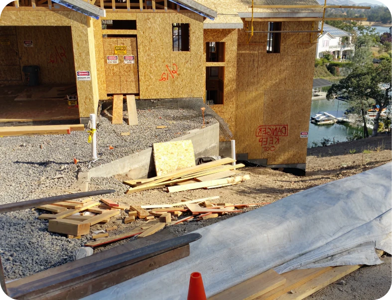 House under construction near water