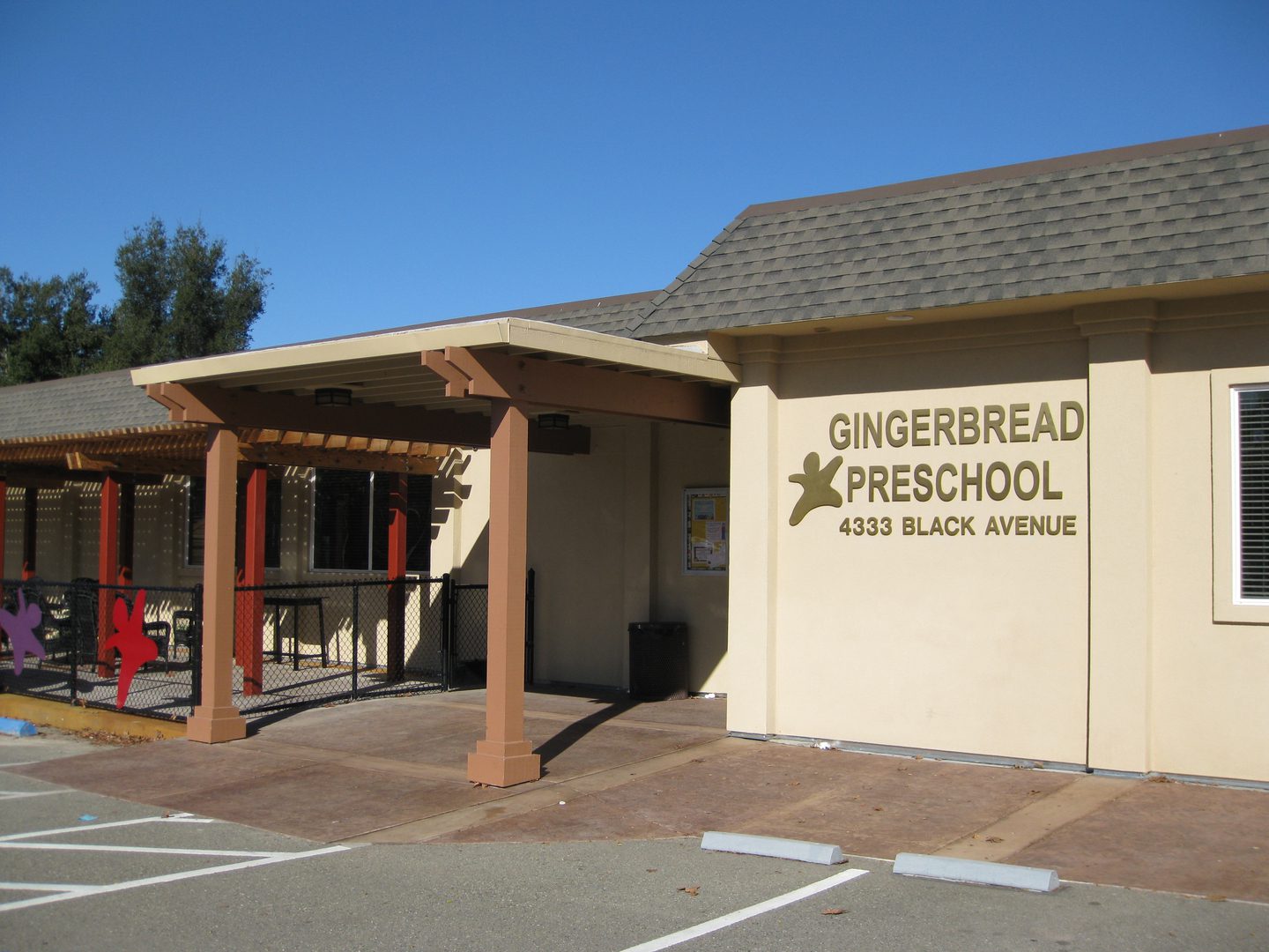 School entrance with sign and awning